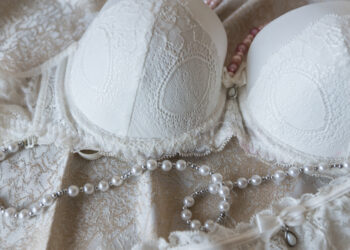 Women's lacy white underwear. Lingerie of the bride with a pearl thread